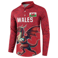 Red rugby button sweatshirt with Wales chest print and long sleeves, dragon mascot