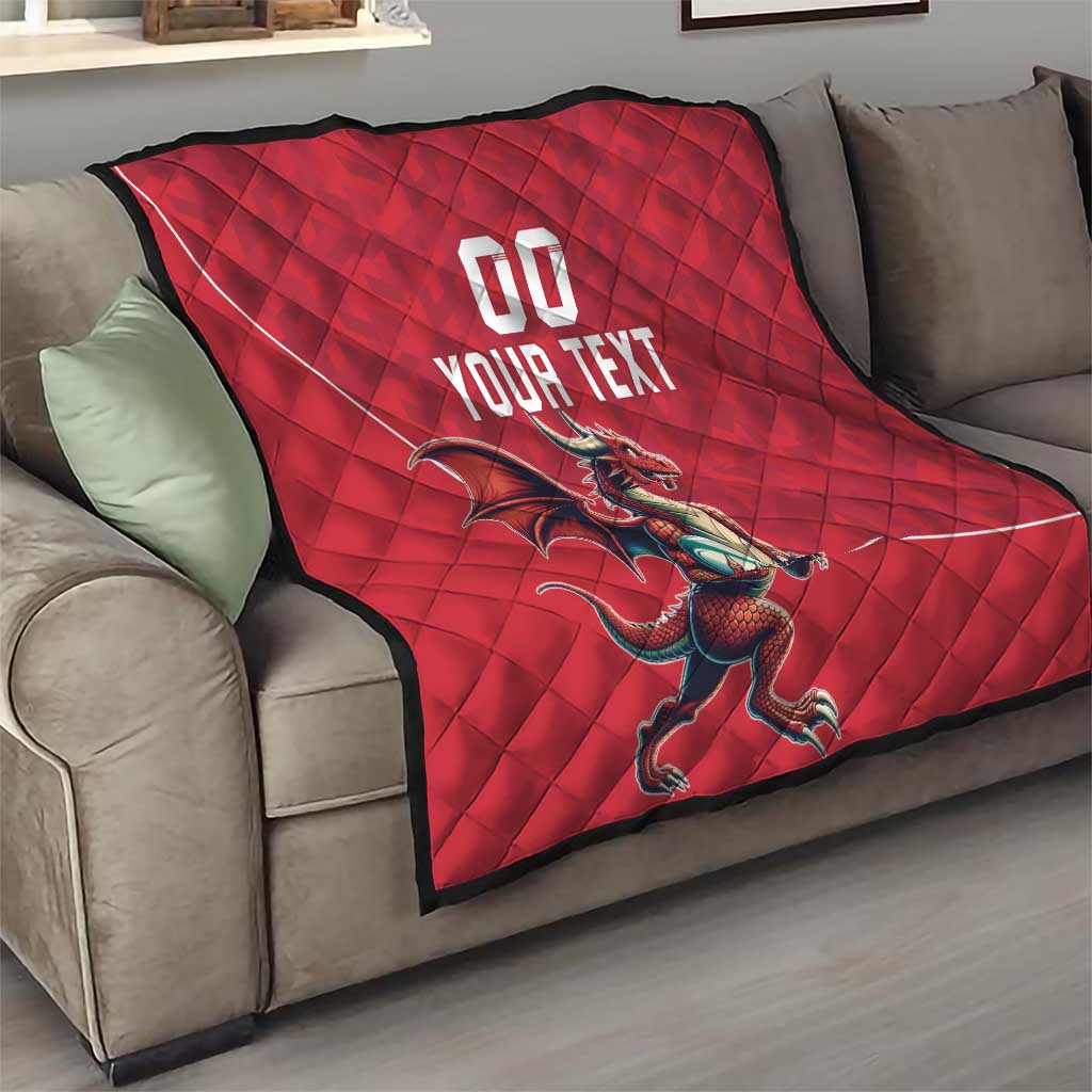 Red quilt blanket draped on a sofa with Welsh dragon graphic and 'YOUR TEXT'.
