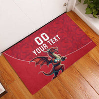 Red Welsh dragon rubber doormat with custom text design, rectangular