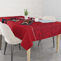 Red rugby tablecloth with Welsh dragon graphic, corner view on dining table