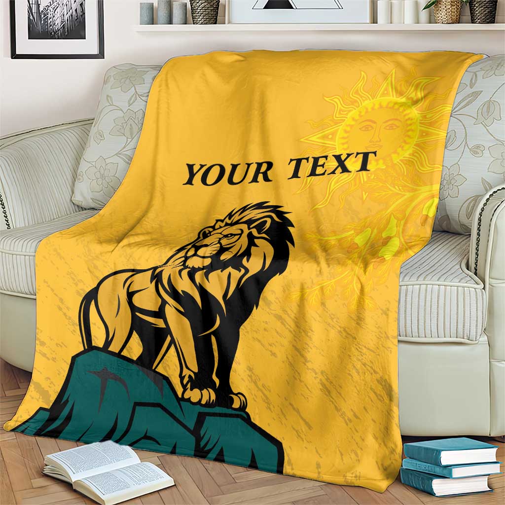Yellow lion graphic personalized blanket on armchair with 'YOUR TEXT' and sun face