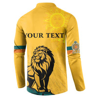 Yellow button sweatshirt back shows YOUR TEXT with lion and sun face emblem