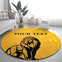 Personalized round yellow rug featuring lion head and 'YOUR TEXT' banner