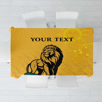 Yellow personalized tablecloth with lion and sun-face design and 'YOUR TEXT' headline