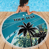 Blue round beach blanket with palm tree art, 'YOUR TEXT' header and white fringe