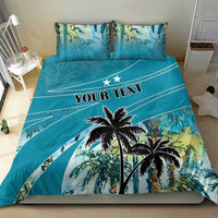 Blue bedding set with palm tree print and centered "YOUR TEXT" graphic on duvet