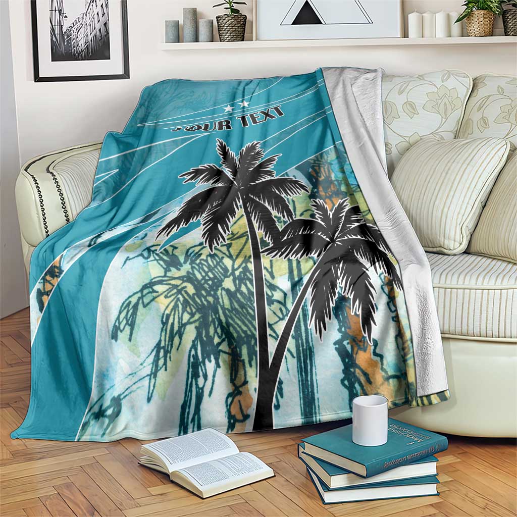 Personalized blue blanket with palm print and 'YOUR TEXT' on couch
