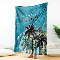 Personalized blue beach blanket with coconut palms, stars, and 'YOUR TEXT' design