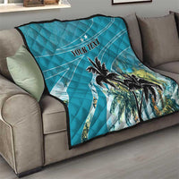 Blue quilted throw on sofa with palm trees and "YOUR TEXT" lettering