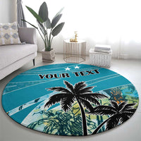 Round blue rug with black palm trees and custom text banner, tropical island style