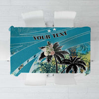 Blue personalized tablecloth with tropical palm print and “YOUR TEXT” header
