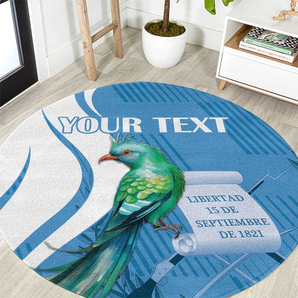 Blue round carpet with green quetzal bird, liberty text, and 'YOUR TEXT'
