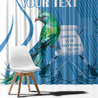 Personalized window curtain panel close-up with quetzal bird and blue text design