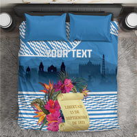 Blue bedding set with tropical floral accents, custom text, and city skyline on duvet