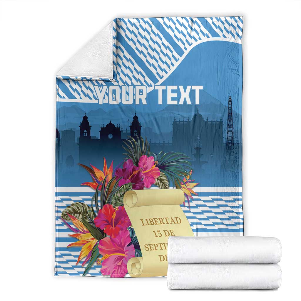Personalized Independence Day blanket folded, blue zigzag pattern with tropical flowers and event text.