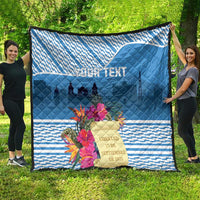 Blue quilt with quilted pattern, tropical flowers and castle skyline text