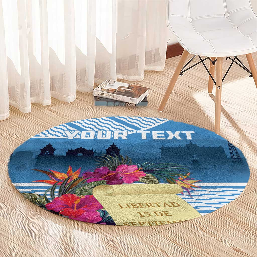 Blue round rug with tropical flowers and gold banner text LIBERTAD 15 DE.