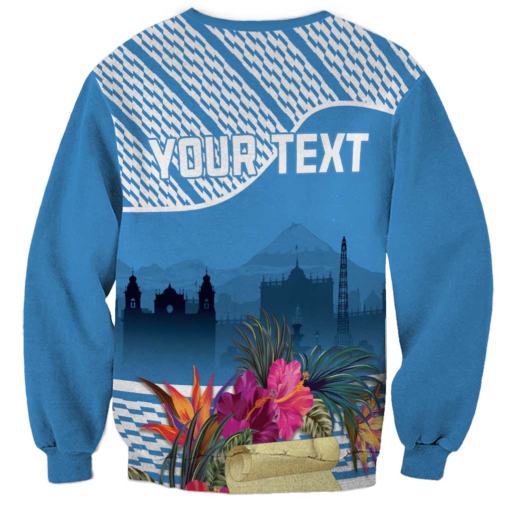 Blue unisex sweatshirt back with large YOUR TEXT design and tropical flower scene