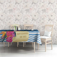 Blue geometric tablecloth with tropical flowers and 'SEPTIEMBRE DE 1821' text
