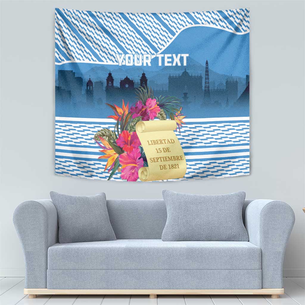 Blue Guatemala independence tapestry with tropical flowers, scroll banner, and blue-white pattern
