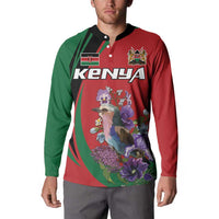 Men's button-up sweatshirt on model, red and green with bird-and-flower print