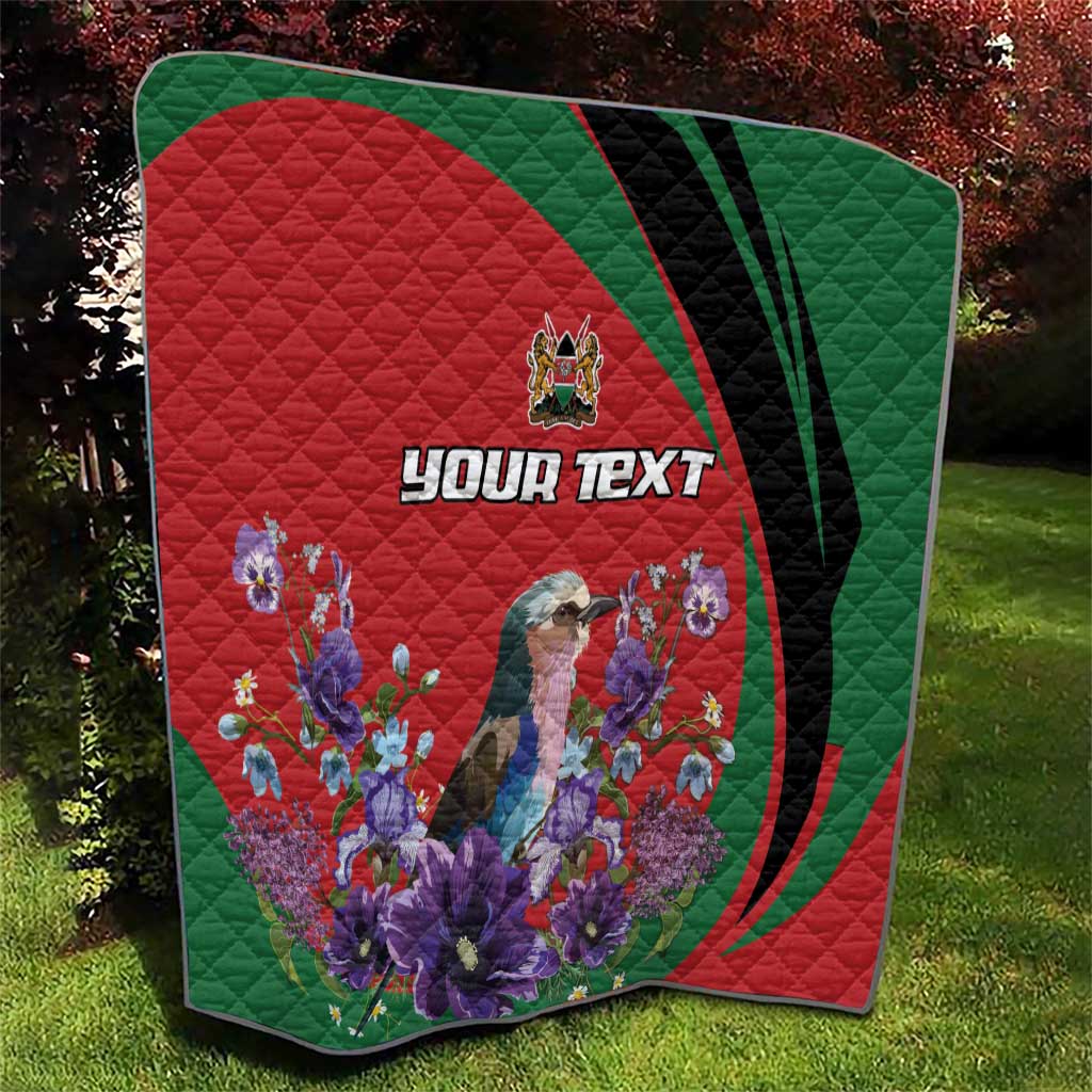 Personalized quilt showing red center, green border, purple floral bouquet, and “YOUR TEXT”