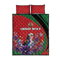 Red quilt bed set with green stripe and violet flowers, “Your text” centered, two pillows