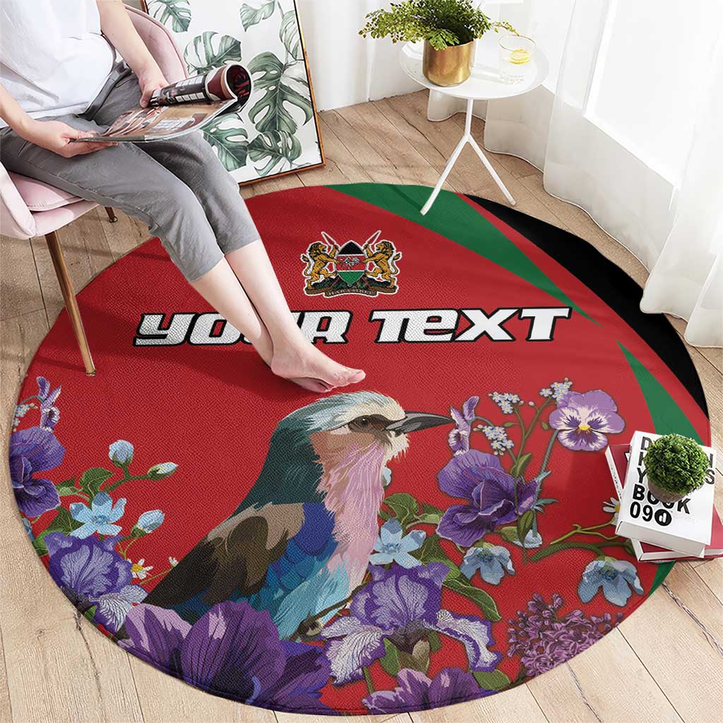 Red round personalized rug with bird and purple blossoms, green edge, "YOUR TEXT"