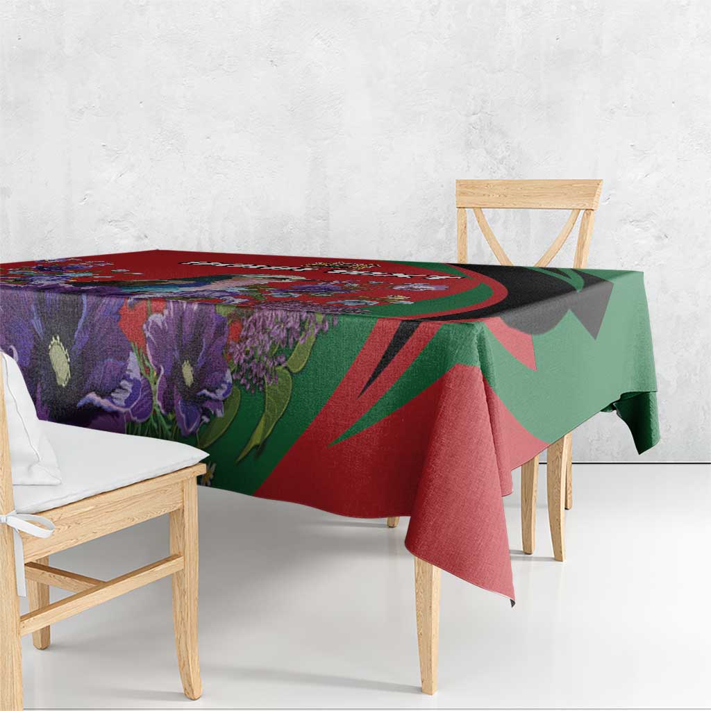 Rectangle tablecloth in red, green, and dark purple with purple floral leaf pattern