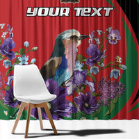 Roller window curtain with red background, green accents, and large purple flower and bird pattern