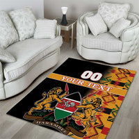 Black area rug with Kenya coat of arms, lions and shield, multicolor Kente border