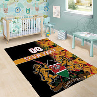Black area rug with Kenya coat of arms crest and multicolor Kente pattern edging