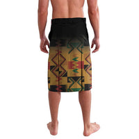 Black beach shorts with Kente-style geometric print panel, elastic waistband