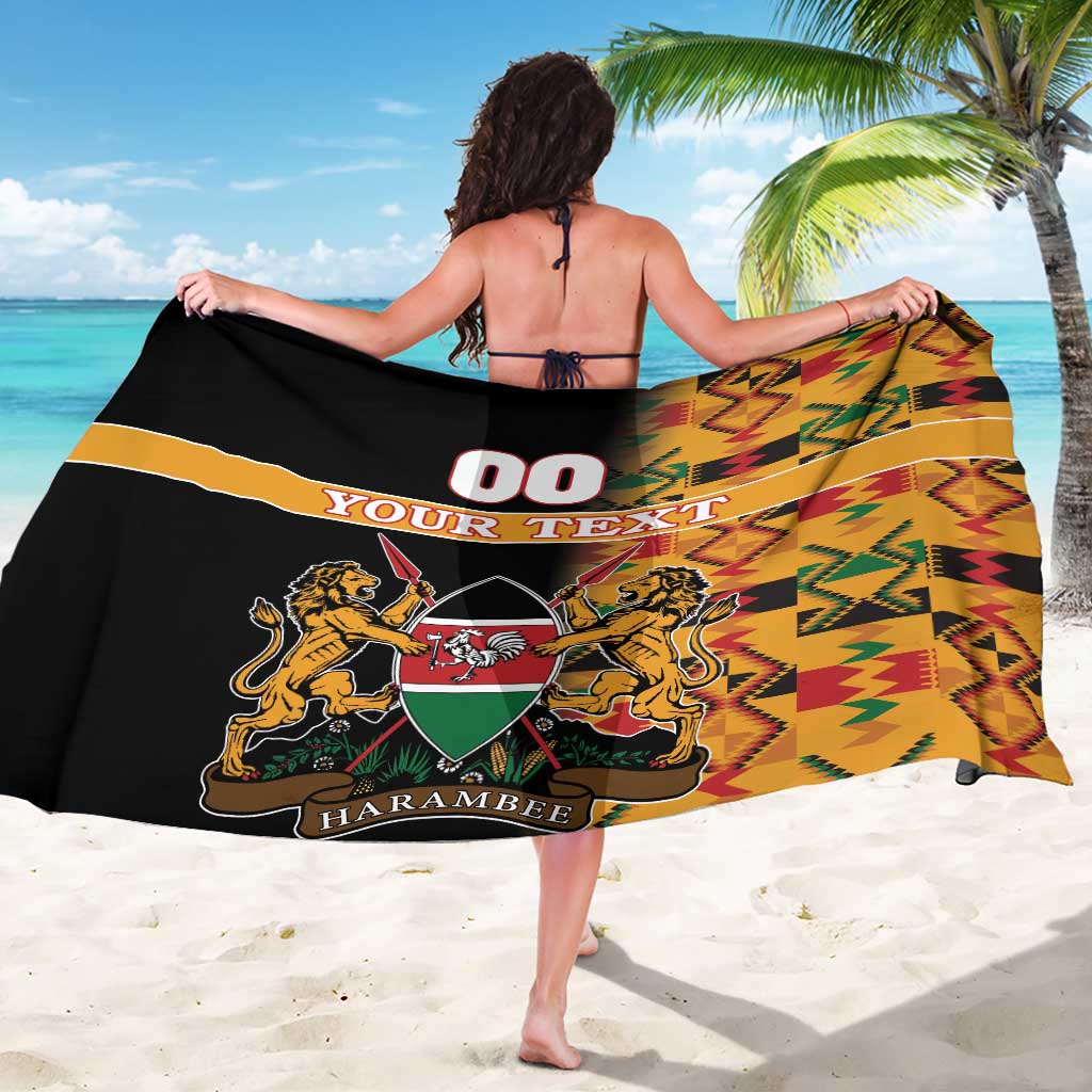 Black custom sarong, back view, with kente zigzag pattern and crest artwork