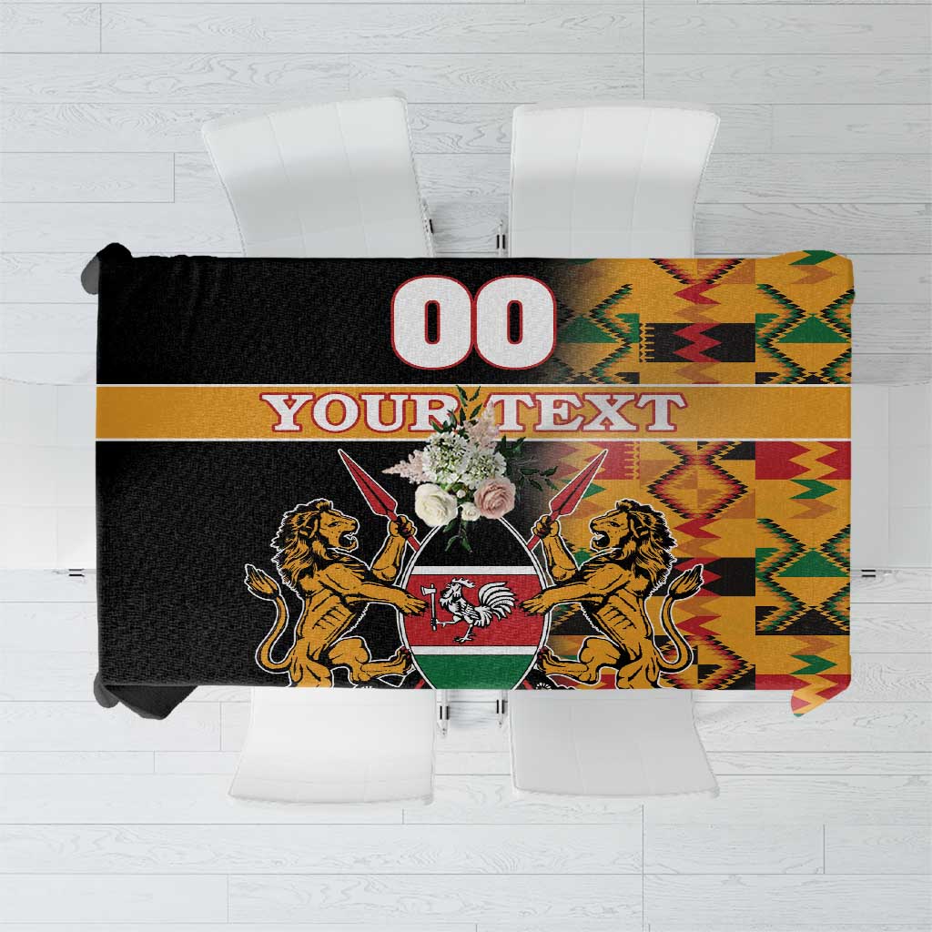 Black tablecloth with Kenya coat of arms and kente pattern, showing 'YOUR TEXT' and '00'.