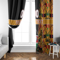 Window curtains with black panels and yellow kente-style side panel, custom text