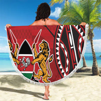 Red round beach blanket with fringe border, emblem with lion and shield, custom text.