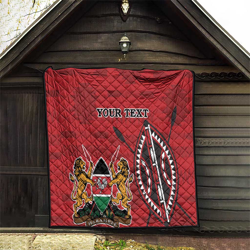 Red quilt with diamond quilting, Kenya coat of arms emblem and “YOUR TEXT” on display