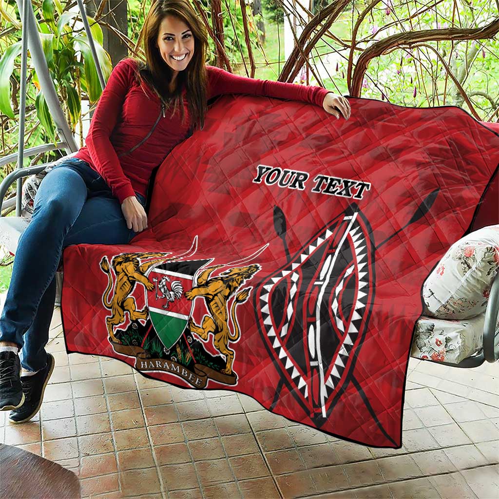 Red quilt with quilted diamonds, Kenya coat of arms emblem and “YOUR TEXT” text print