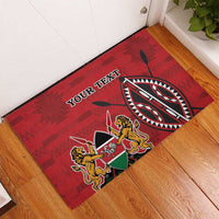 Red rubber doormat corner view with 'YOUR TEXT' and tribal shield emblem with lions
