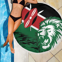 Round Kenya flag beach blanket with lion head graphic, white fringe, draped over person