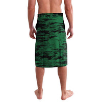 Green lavalava shorts with dark abstract print and elastic waistband