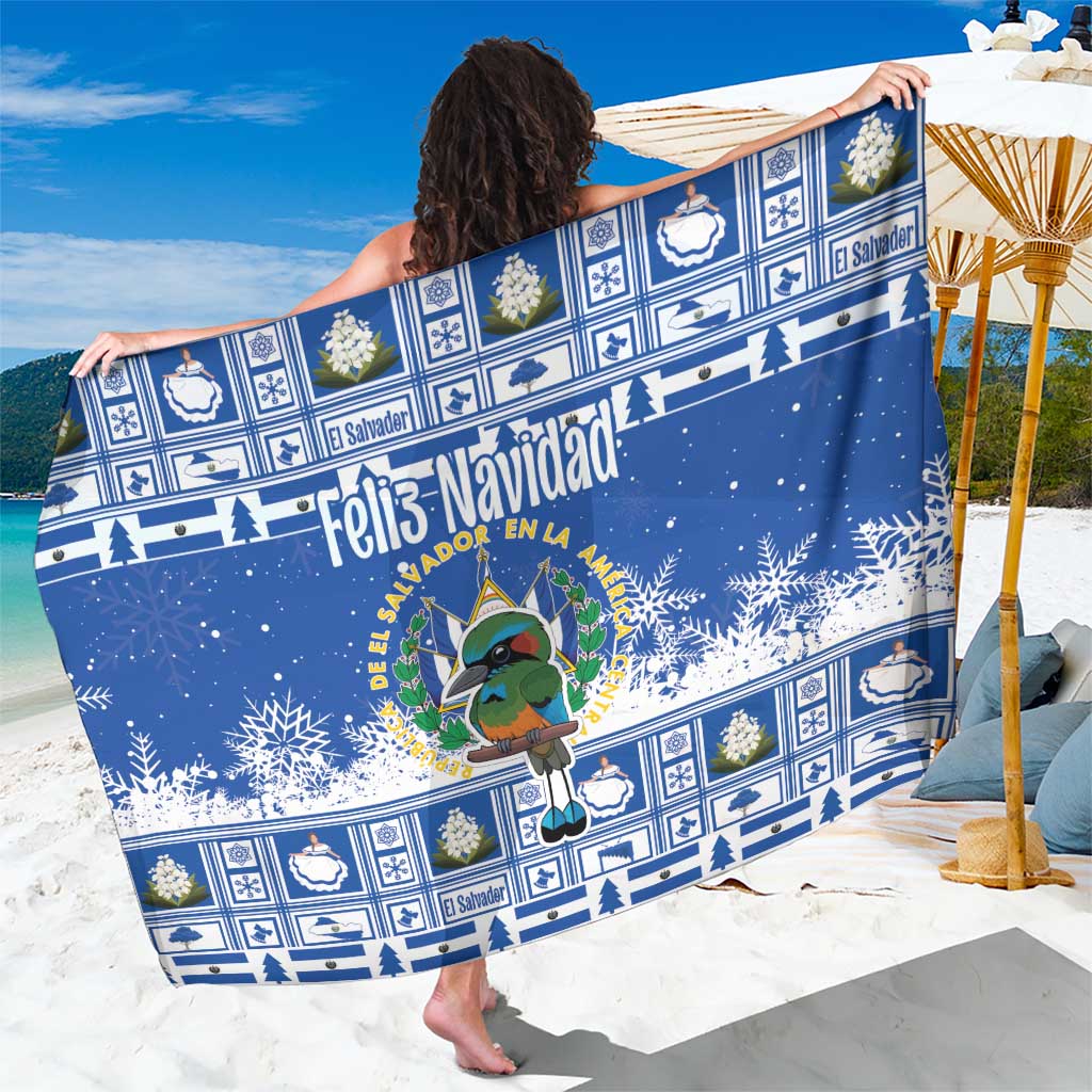 Blue Christmas sarong with cartoon coat of arms, snowflakes, and “Felis Navidad” print