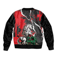 Red and black bomber jacket back with knight and dragon action graphic, ribbed hem