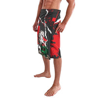 Black and red graphic shorts with knight-and-dragon artwork on the leg