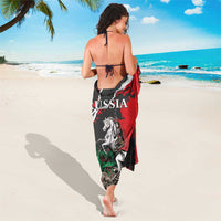 Red, black and white sarong with knight graphic and RUSSIA text; dragon illustration