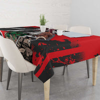 Red and black grunge tablecloth with knight and dragon design on dining table