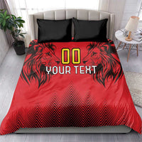 Red duvet cover with 'YOUR TEXT' and lion head artwork, plus two black pillowcases
