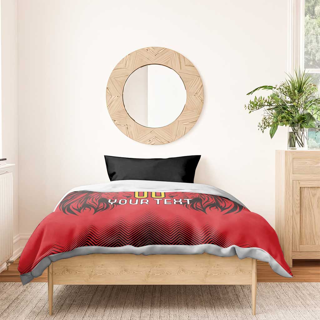 Red duvet cover with lion head and 'YOUR TEXT' text, paired with two black pillowcases