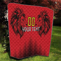Red quilt blanket with black palm-lion design and gold “00” above custom “YOUR TEXT”